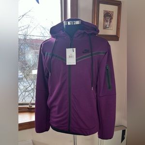 Nike Women's Purple Tech Suit: Sleek Style, Unmatched Comfort